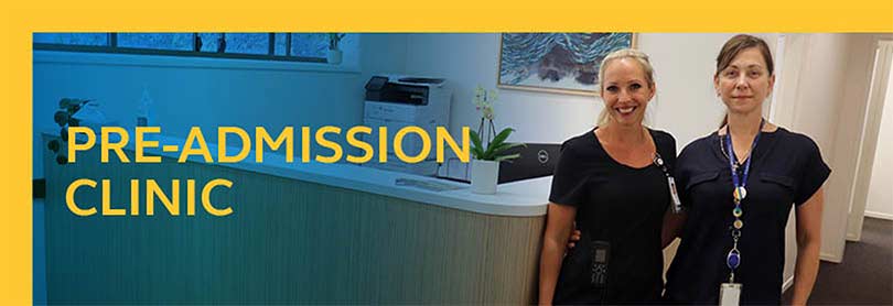 Two friendly nurses stand at the reception area of the Buderim Private Hospital Pre-Admission Clinic.